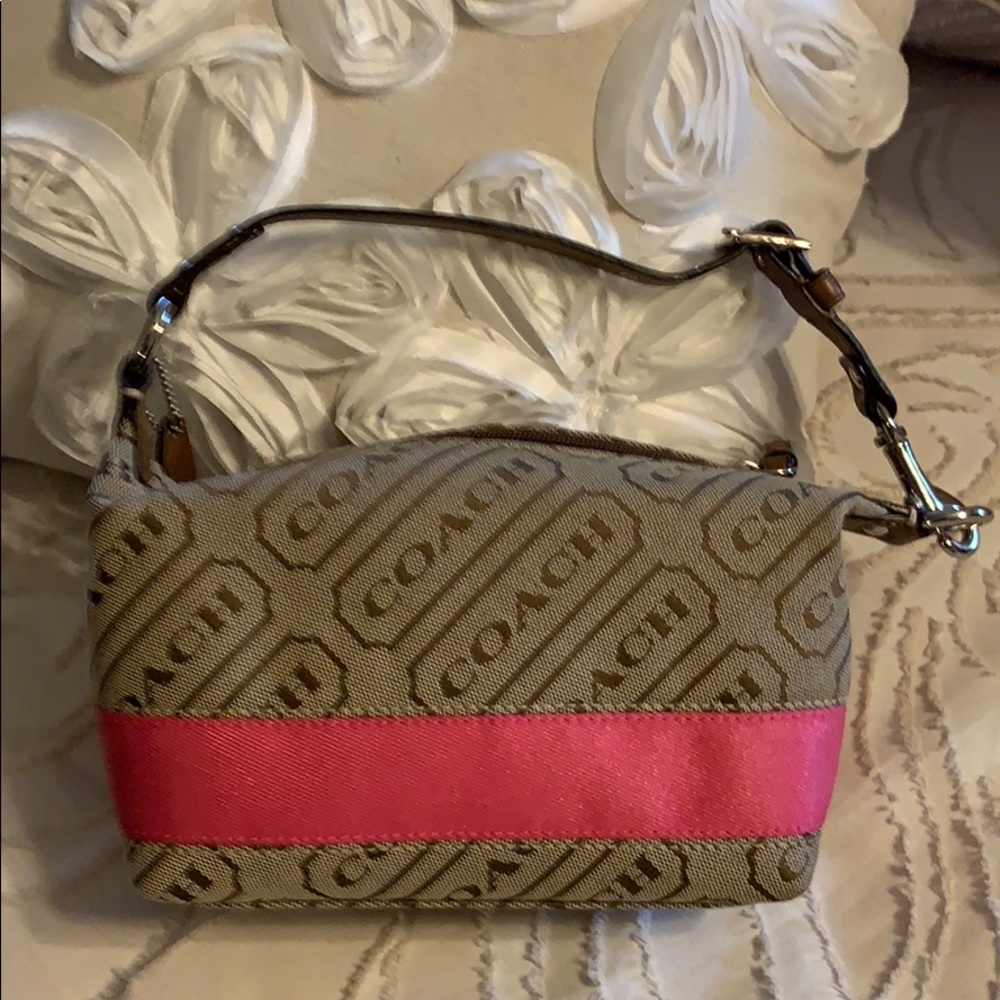 Small coach bag never used